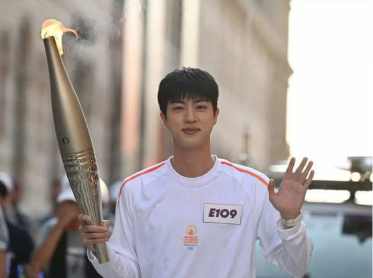 BTS' Jin Becomes First Korean Artist to Lift Olympic Torch.
