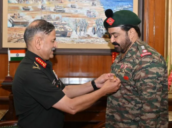 COAS General Upendra Dwivedi Honors Mohanlal with COAS Commendation Card for Societal Contributions.